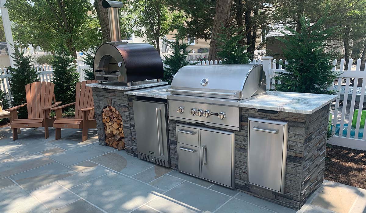 rta outdoor kitchen in new jersey with grill and pizza oven