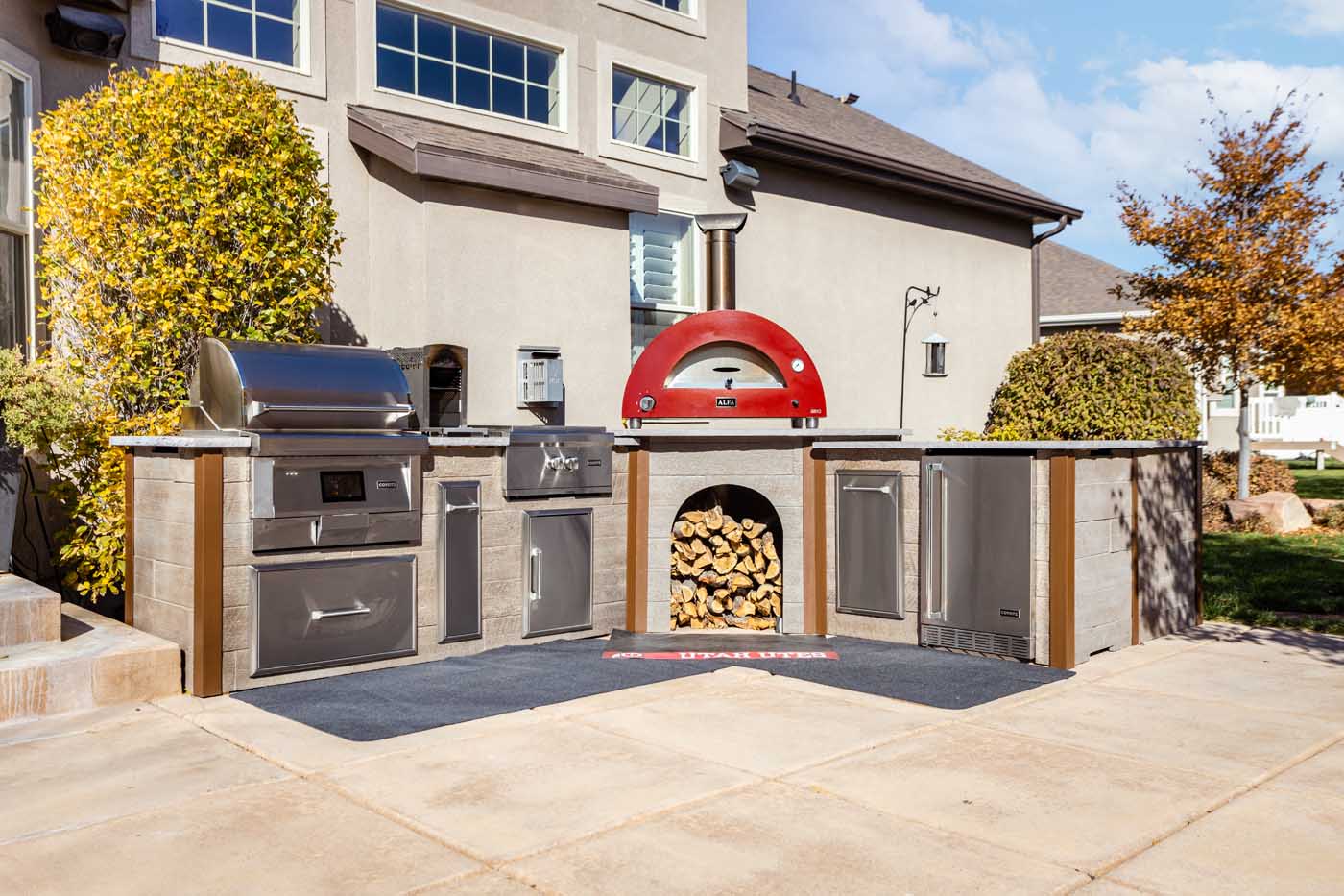 rta outdoor kitchen paired with an alfa pizza oven that is ready to enjoy