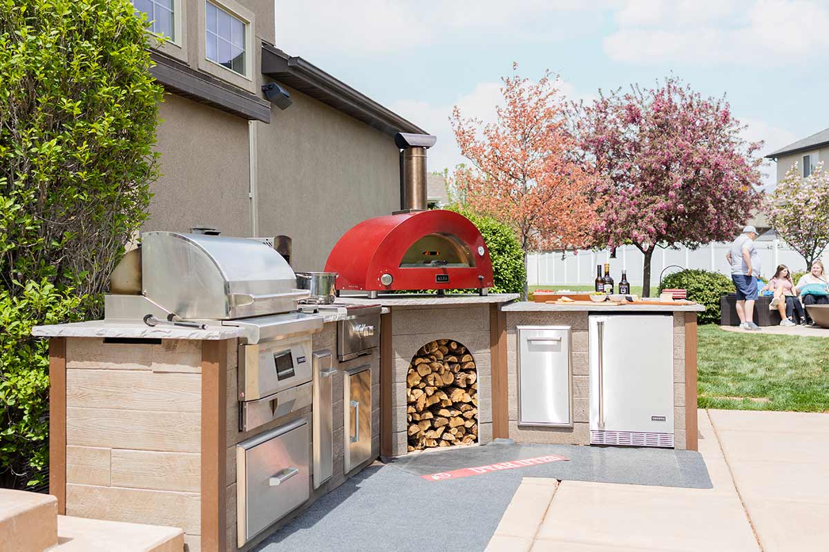 building an rta luxury outdoor kitchen island with pizza oven in outdoor living space
