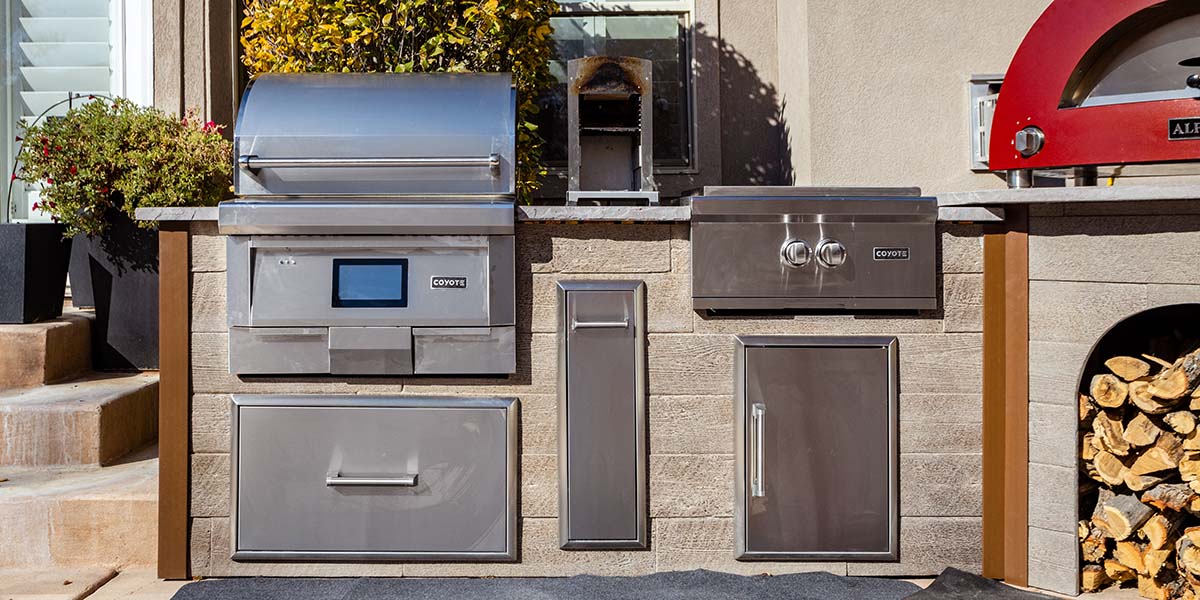 rta outdoor kitchen with weathered wood finish and pellet grill