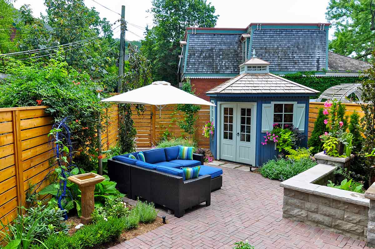 shed in backyard space with outdoor seating