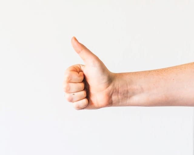 Person Giving Thumbs Up Just the Arm