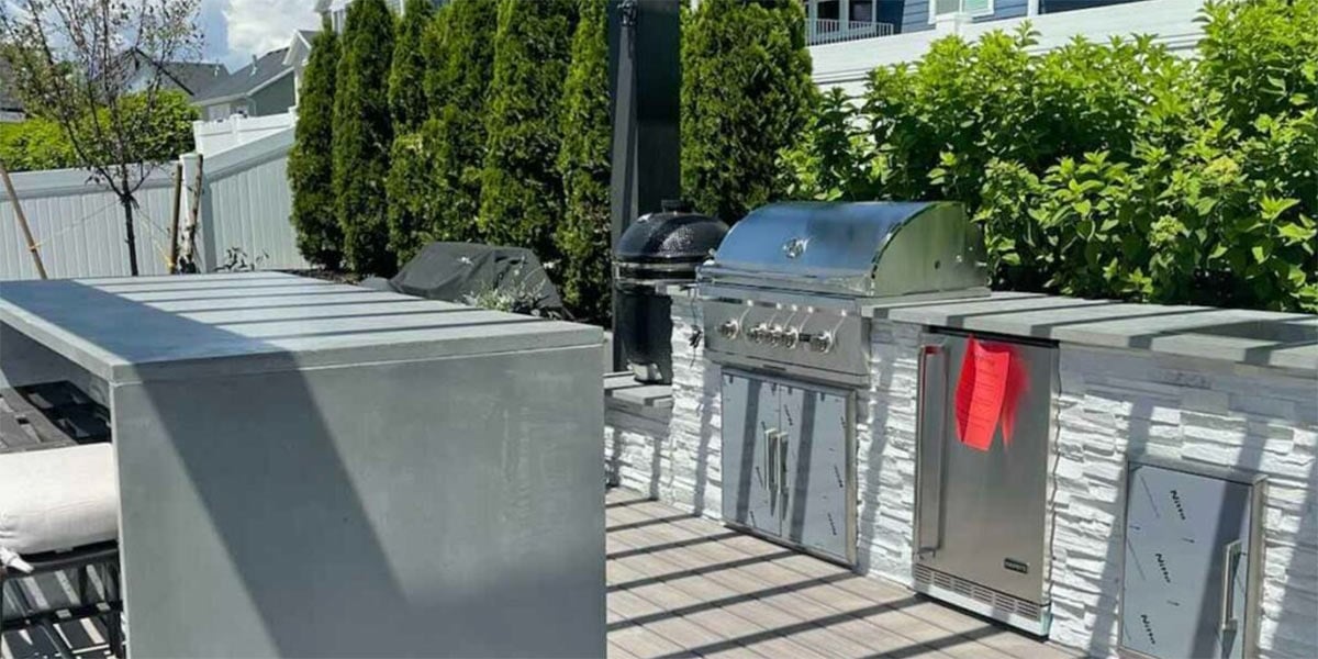 stacked stone chalk modern outdoor galley kitchen