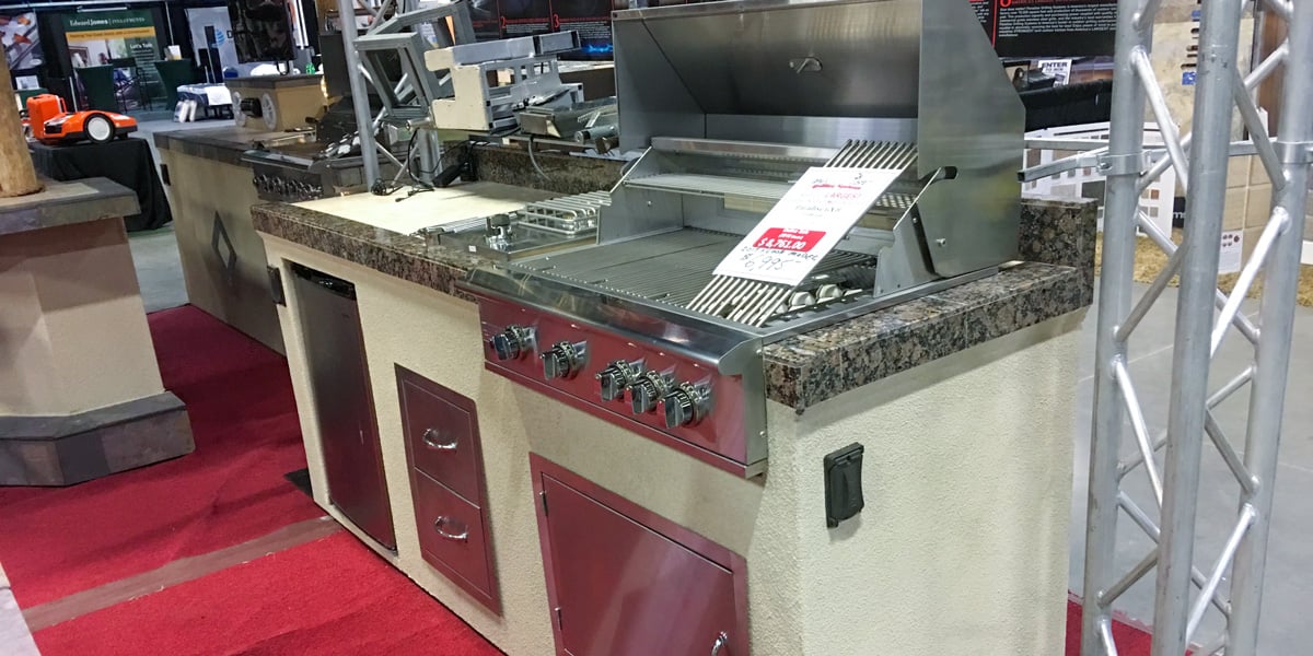 stucco outdoor kitchen kit in showroom