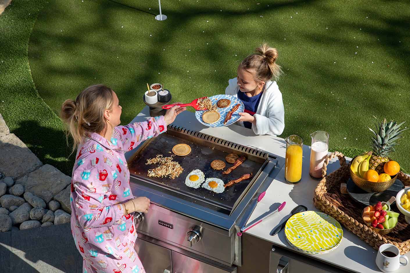 tamara day cooking breakfast on her coyote griddle built in her rta outdoor kitchen