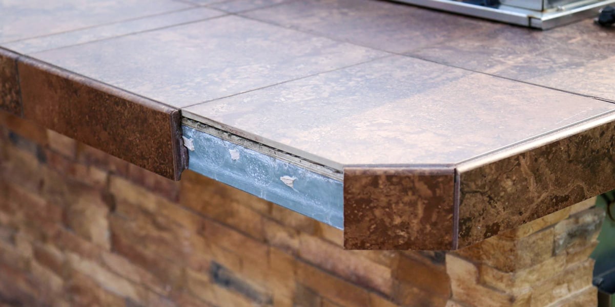 tile outdoor kitchen material falling off countertop