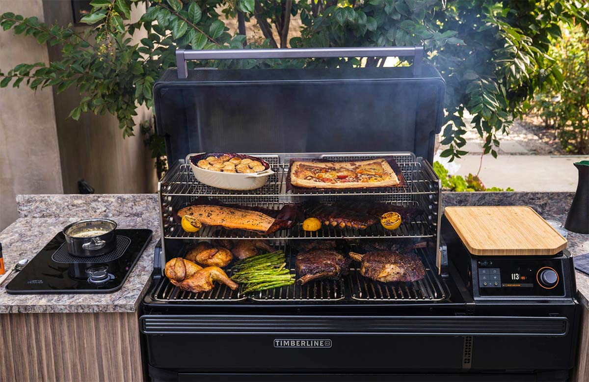 traeger timberline xl with food grilling on it