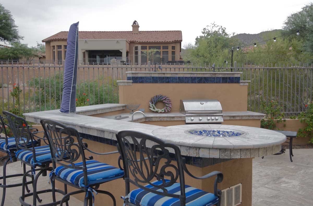 Your choice of countertop material for your outdoor kitchen impacts maintenance