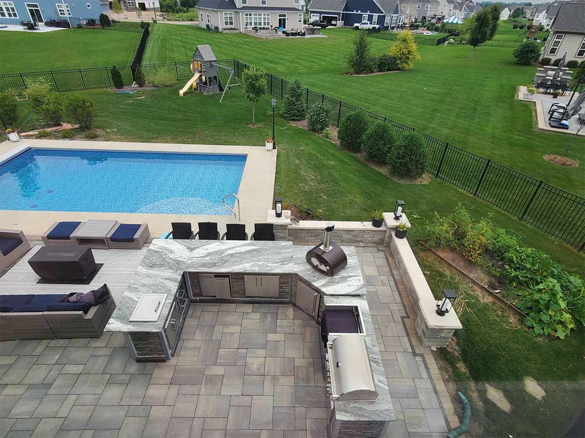 Outdoor patio kitchen and bar ideas by a pool