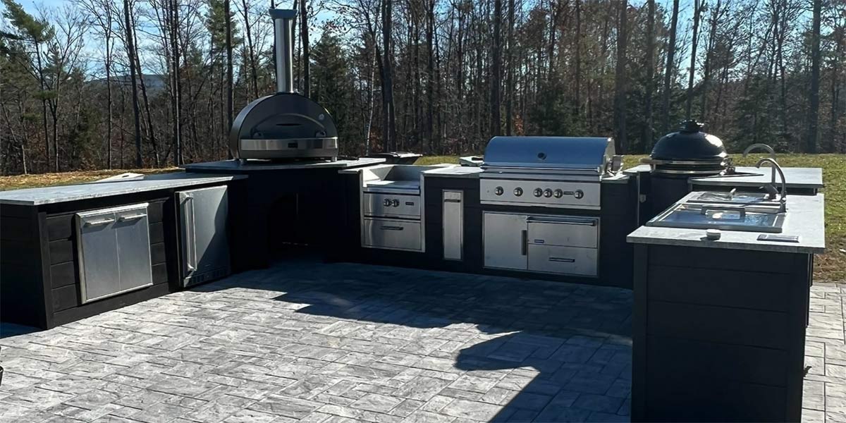 u-shaped outdoor kitchen with gas grill pizza oven power burner and kamado smoker