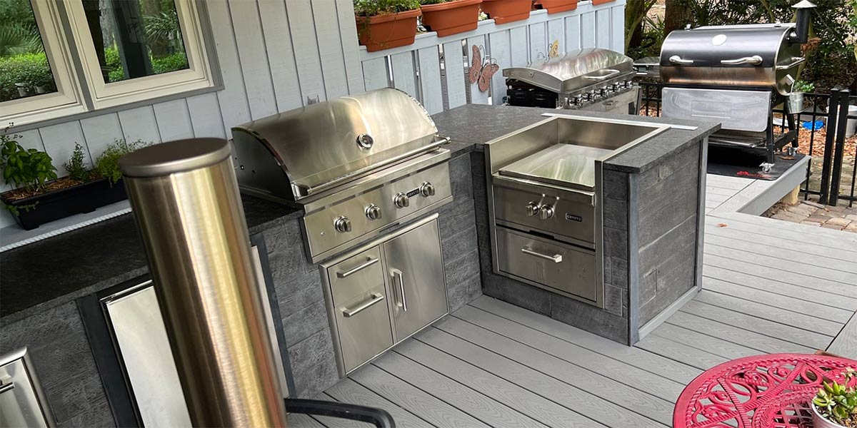 weathered wood ash outdoor kitchen on deck