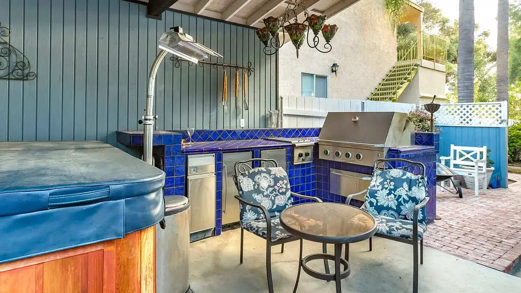 outdoor kitchen with blue tile material finish